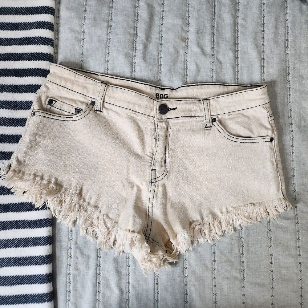 BDG Cream Colored Distressed Short Shorts
